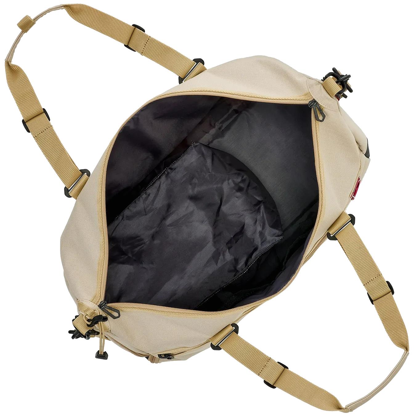 The Yonex BA72611EX Gearlogic Badminton Boston Bag in beige, seen from above, displays a roomy black interior lining. Made of recycled polyester, it has tan adjustable straps with black buckles and zippers.