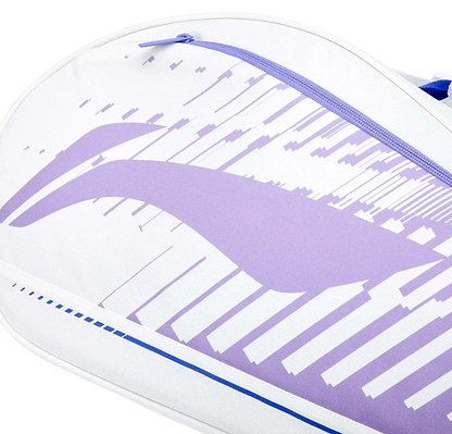 Close-up of the Li-Ning Training Series 3 Racket Badminton Bag in white and purple, featuring a curved purple design, diagonal lines, and a top purple zipper—ideal for stylishly carrying your racket.