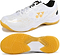 The Yonex Power Cushion SHB 101 Badminton Shoes in white and gold feature honeycomb patterns, a yellow textured grip sole with shock absorption, and the Yonex logo on both the side and sole.