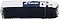 The Babolat Badminton Net is a standard-length black net with a white top band and metal grommets, featuring the Babolat logo on a blue patch—ideal for badminton games.