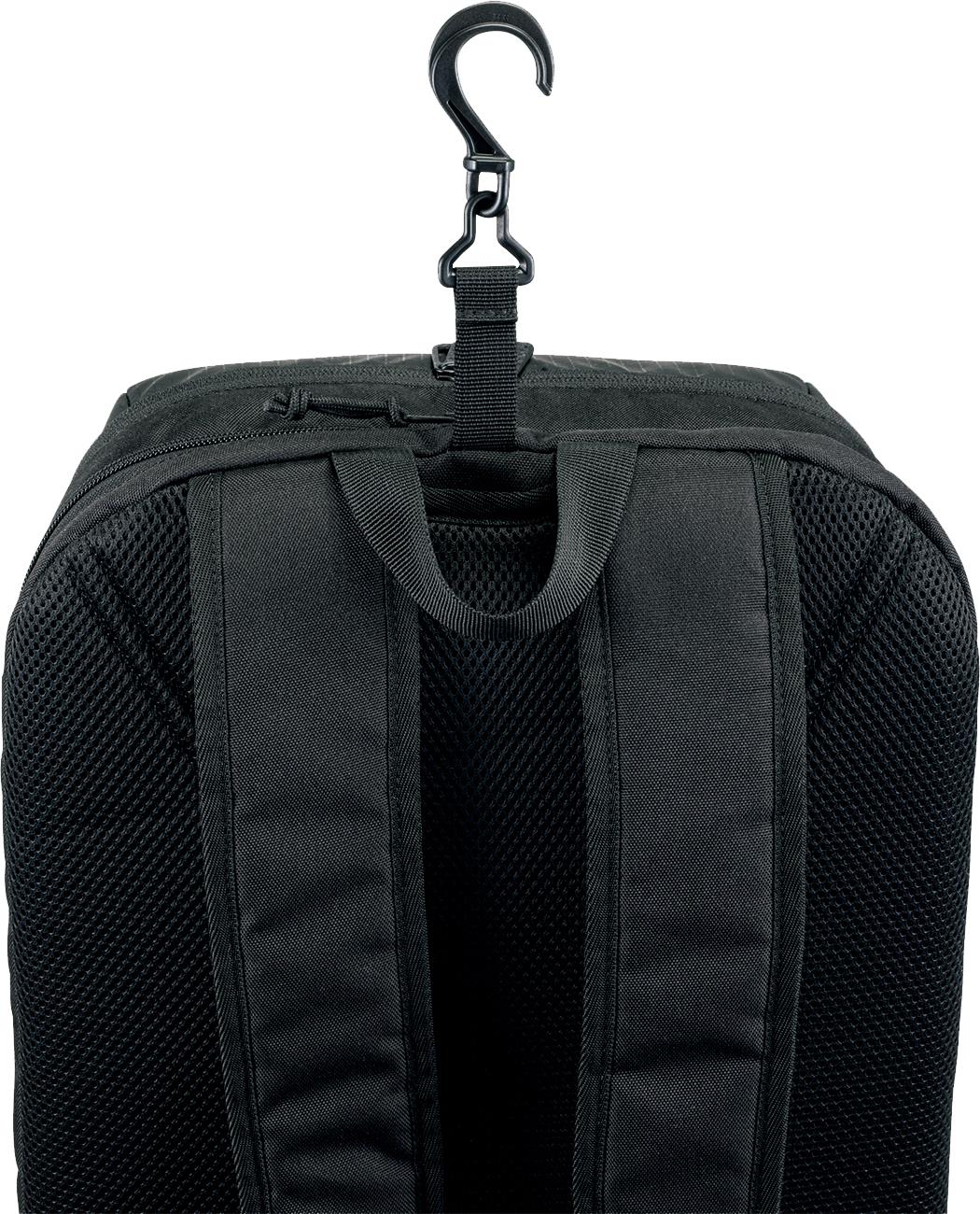 Close-up of the Yonex 42512EX Team Badminton Backpack in Ruby Red, highlighting its two padded shoulder straps, fabric handle, and a top plastic hook for hanging.