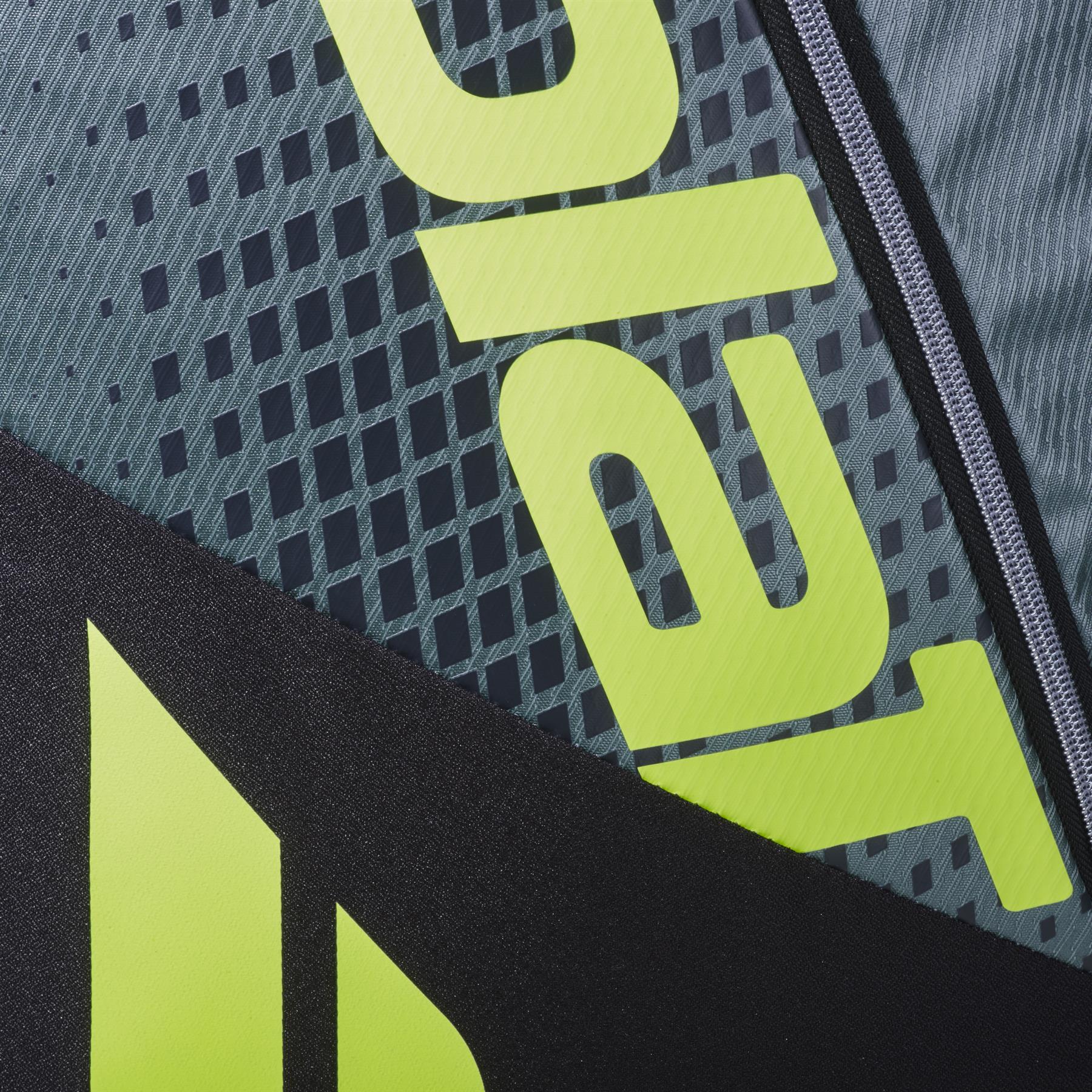 Close-up of the Babolat RH6 Pure Aero 6 Racket Badminton Bag in grey and yellow, showcasing textured panels, bold yellow branding, and a stylish zipper detail from Babolat.
