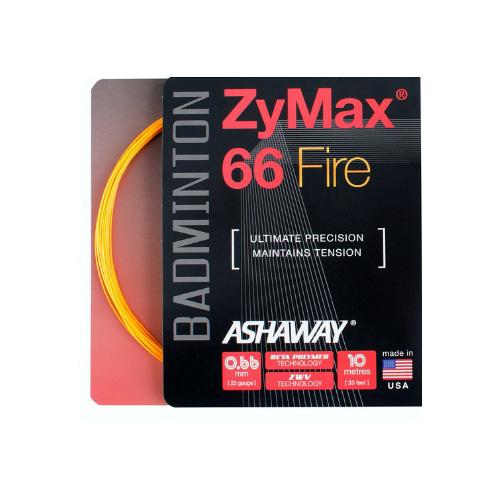 The image features a packet of Ashaway Zymax 66 Fire badminton strings in orange, highlighting their micro gauge design for peak performance. The packaging underscores its quality with phrases such as "Ultimate Precision, Tension Stability" and prominently indicates that it is made in the USA.