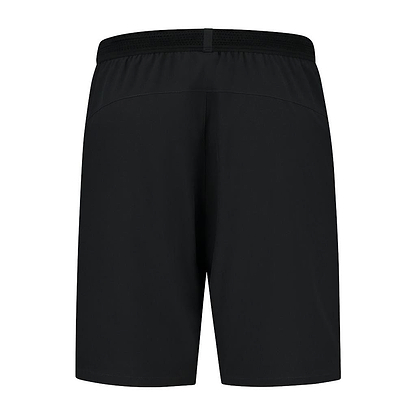 The K-Swiss Hypercourt Men's Shorts in black are shown from the back, showcasing an elastic waistband and a straight cut. The smooth fabric emphasizes K-Swiss's dedication to performance apparel, making these shorts ideal for both sports and casual wear.