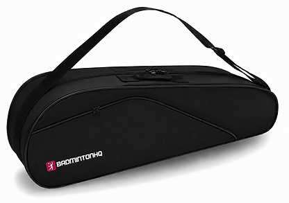 The BadmintonHQ 6 Racket Badminton Bag - Black features a shoulder strap, zippered compartments, and a white and pink “BADMINTONHQ” logo. It holds up to 6 rackets for easy storage and transport.