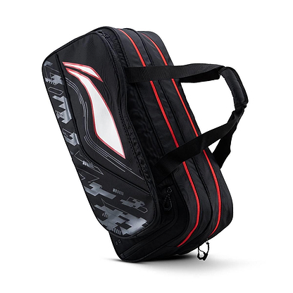 The Li-Ning Team 6 Racket Badminton Bag in black features zipper compartments and carrying handles, making it ideal for storing up to 6 rackets or as a kit bag. It stands upright on a white background.