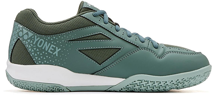 A khaki Yonex Strider Ray WIDE unisex badminton shoe with a textured sole and mesh accents is shown in side profile on a white background.