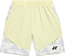 The Yonex 15240YX Knit Men's Badminton Shorts in Champagne feature a light yellow color with white and gray geometric accents, breathable fabric, elastic waistband, side pockets, and a small black Yonex logo on the lower left leg.