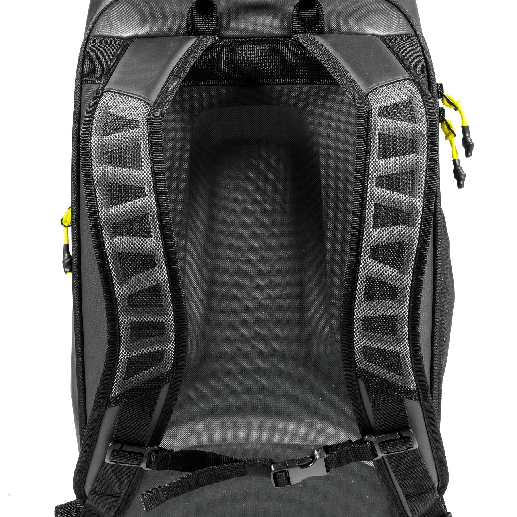 Close-up of the Tecnifibre Reform Badminton Backpack - Black, showing padded mesh shoulder straps with a chest buckle and yellow zipper pulls on the sides. This backpack by Tecnifibre is made from durable EVA material.
