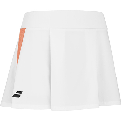 The Babolat Play Women's Badminton Skirt in white and orange features a wide waistband, a small black logo at the bottom, and an orange vertical stripe. Made from recycled polyester with Fiber Dry technology, it ensures dryness and comfort during play.