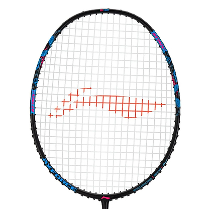 The Li-Ning Axforce Big Bang 6U Badminton Racket in black features an Ex-Light frame accented with vibrant colors and a striking red pattern on the strings. Its oval-shaped design is enhanced by the Sonic Boom System, complemented by blue and pink details, with a crisscross string pattern.