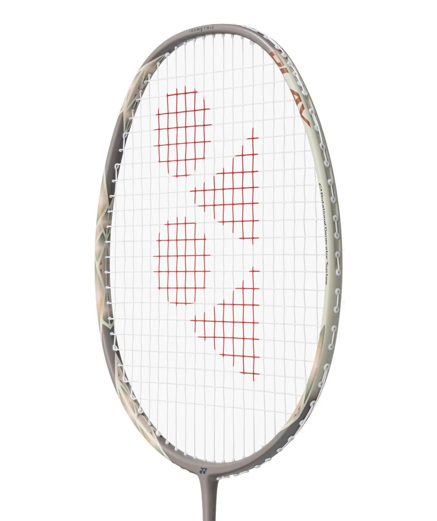 Close-up of the Yonex Astrox 77 Play 4U Badminton Racket in light beige, featuring a gray frame and red geometric string pattern. Suitable for beginners, this Yonex racket is photographed against a plain white background.