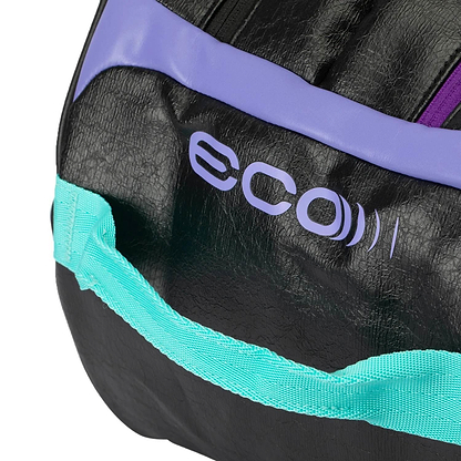 Close-up of the black Li-Ning International Elite 6 Racket Badminton Bag with a purple strap, featuring "eco" print in purple and a light blue side handle. The textured, slightly reflective material provides ample storage for avid players.