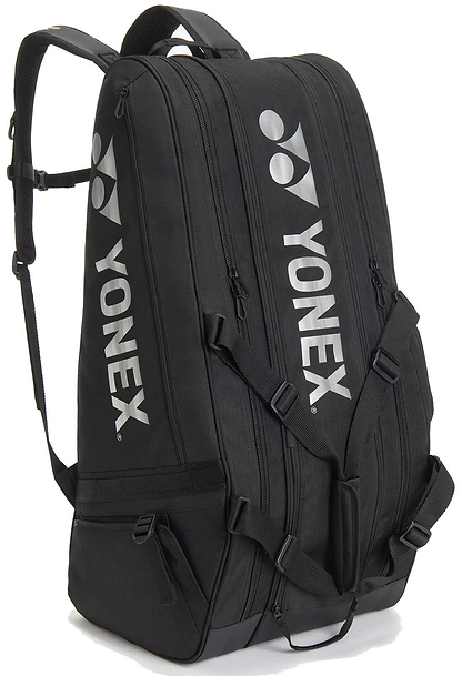 The Yonex BA72629EX Gearlogic 9 Racket Badminton Bag in black features multiple zippered compartments, shoulder straps, and white Yonex branding—perfect for serious players seeking ample storage.