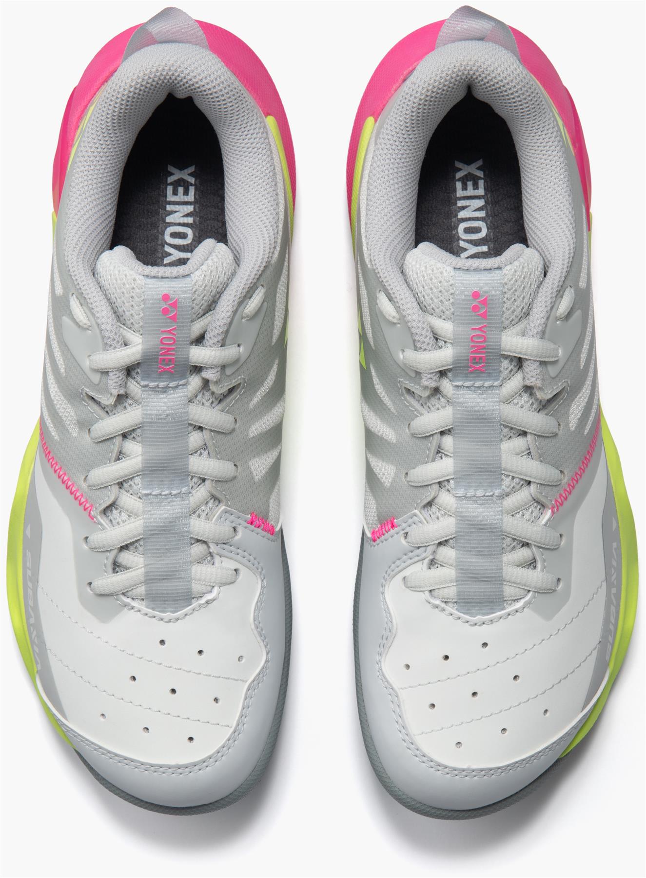 A pair of Yonex Subaxia GT Women's Badminton Shoes in light grey with pink and yellow accents, featuring GRPHT THRTTL technology, shown from above on a white background.