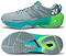 A pair of Yonex Subaxia GT 2026 Women's Badminton Shoes in grayish green is shown from the side and bottom; featuring Yonex branding on the side and a textured sole with GRPHT THRTTL technology for improved grip.