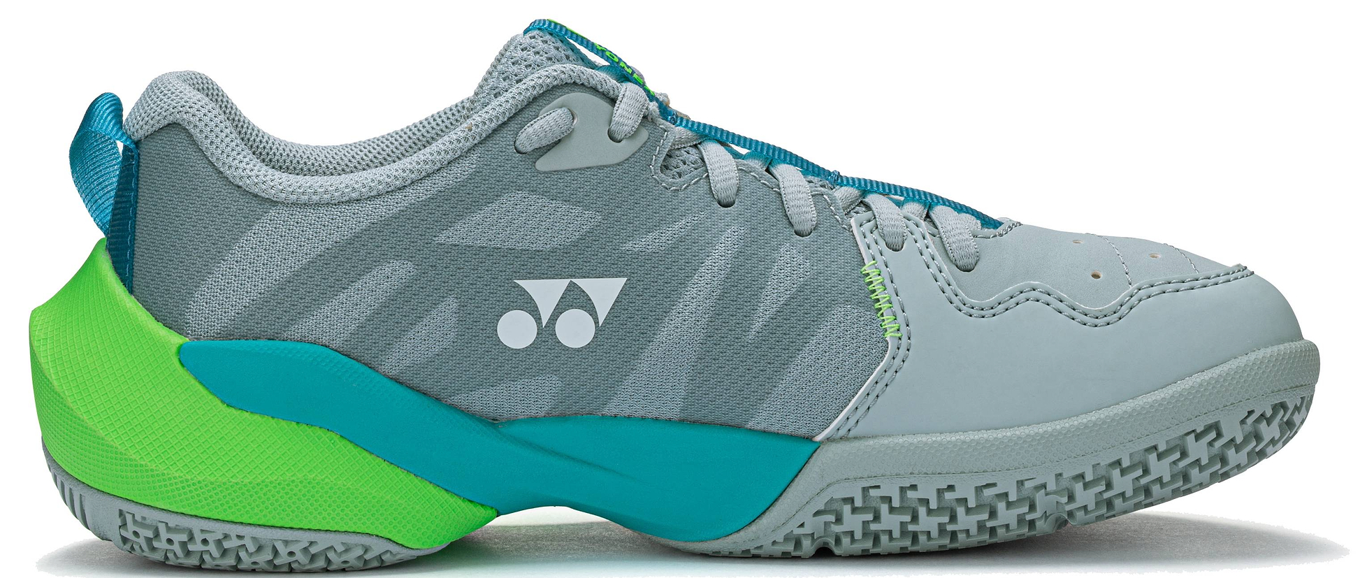The Yonex Subaxia GT 2026 Women's Badminton Shoe in grayish green features teal and bright green accents, a textured sole, GRPHT THRTTL technology, and a white Yonex logo on the side.
