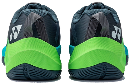 Rear view of the Yonex Subaxia GT WIDE 2026 Unisex Badminton Shoes in Dark Green, displaying black, gray, green, and blue accents. The white Yonex logo appears on the heel with a textured outsole for grip and Power Cushion Rev technology.