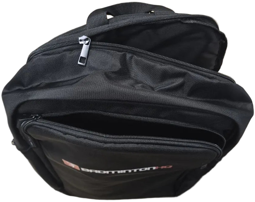 The BadmintonHQ Badminton Backpack - Black by BadmintonHQ features two main zippered compartments, a top handle, and durable fabric, ideal for carrying rackets and gear. Both compartments are partially open to show the spacious interior.