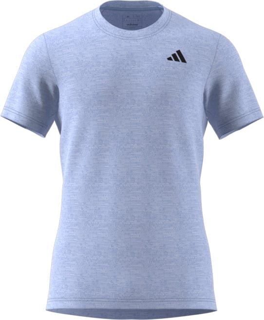This adidas Men's Freelift Badminton T-Shirt in Blue Dawn features a light blue color with a black triangular logo on the right chest. Designed for active men, it incorporates AEROREADY technology to manage moisture effectively. The simple crew neck design remains plain, making it ideal for badminton enthusiasts.