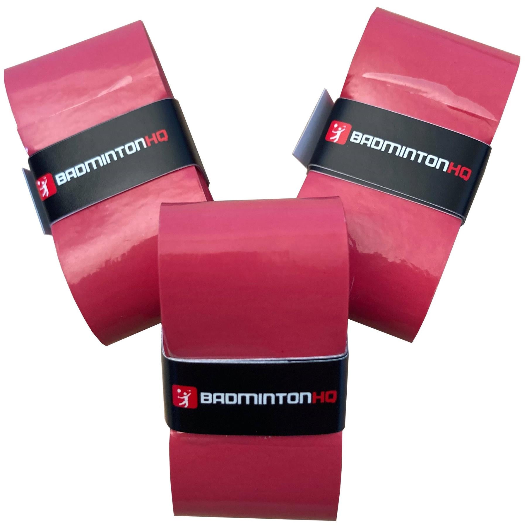 Three red BadmintonHQ overgrips with black "BADMINTON HQ" bands are shown on a white background, providing ultra-tacky grip and sweat absorption for better performance.