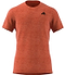 This adidas Men's Freelift AEROREADY T-shirt for badminton sports a solid red design with short sleeves, highlighted by a discreet black logo on the upper left side. The fabric includes a subtle textured pattern, providing both style and breathability for every match.
