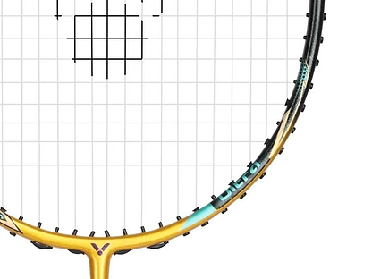 A close-up of the Victor Thruster F C Ultra X Badminton Racket - Gold by Victor shows the frame, strings, and part of the shaft against a white background, highlighting its dynamic power and precise control.