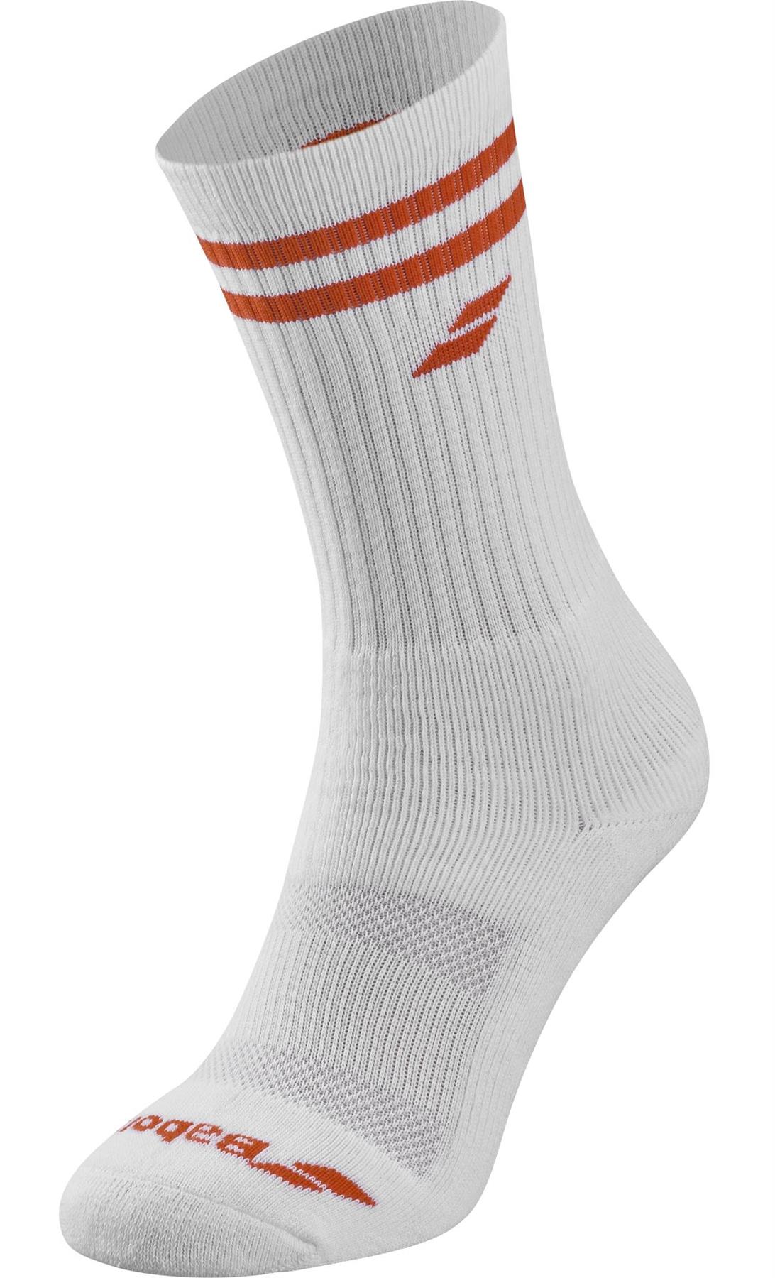The Babolat Team Single Badminton Sock in White/Cherry Tomato features two cherry red stripes near the top, a side Babolat logo, ribbed texture, and added cherry red branding on the toe for comfort and style.