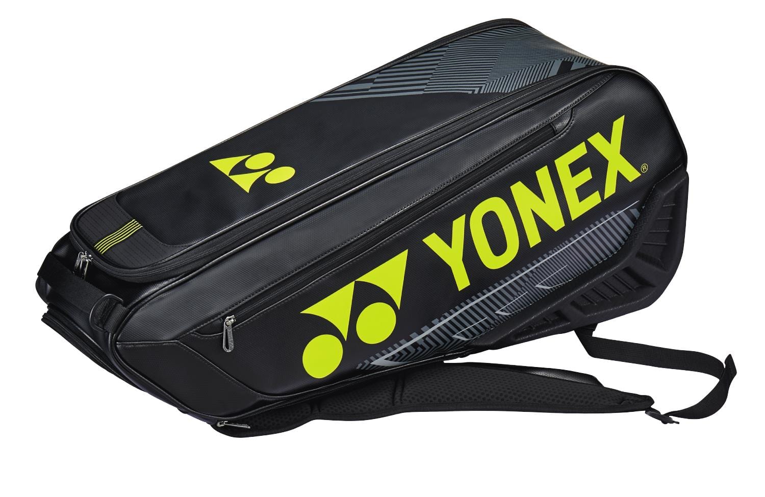 The Yonex 02326EX Expert 6 Racket Badminton Bag in black and yellow comes with convenient backpack straps and proudly displays the Yonex logo and text on its side. It is designed with multiple compartments for ample storage, including a dedicated shoe compartment for all your sports equipment needs.
