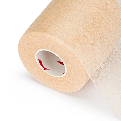 A close-up of a roll of Li-Ning GM100 Cushion Wrap Badminton Grip in natural color, partially unrolled to show its semi-transparent texture and shock-absorbing features. The grip's white core with red markings is set against a plain white background.