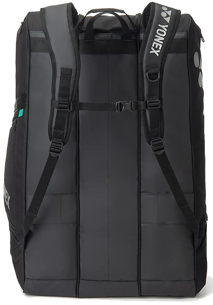 The Yonex BA726212EX Gearlogic 12 Racket Badminton Bag in black features padded shoulder straps, a sternum strap, carry handles, and multiple compartments—ideal for serious players needing a tournament-ready Yonex bag.