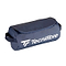 The Tecnifibre Tour Endurance Mini Accessory Bag in navy blue is a cylindrical, waterproof bag with a flap closure, side handles, and white Tecnifibre branding—part of the Tour Endurance collection.