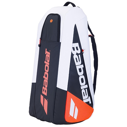 The Babolat RH6 Pure Strike 4th Gen 6 Racket Badminton Bag showcases a sophisticated design, featuring a white and black color scheme with bold red accents. Made from isothermal material, the bag prominently displays the Babolat logo in white against the black areas, providing both style and excellent thermal protection for your equipment.