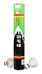 A sleek, green cylindrical container featuring Chinese characters holds the high-quality Snowpeak C1130 Feather Shuttles. In front of this design, two pristine white shuttlecocks are placed against a white background, ensuring BWF-worthy performance.
