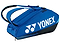 The Yonex 92426EX Pro 6 Racket Badminton Bag in cobalt blue comes equipped with shoulder straps and multiple compartments to accommodate racquets and gear. It prominently displays the Yonex logo in white on the side, merging style with practicality.