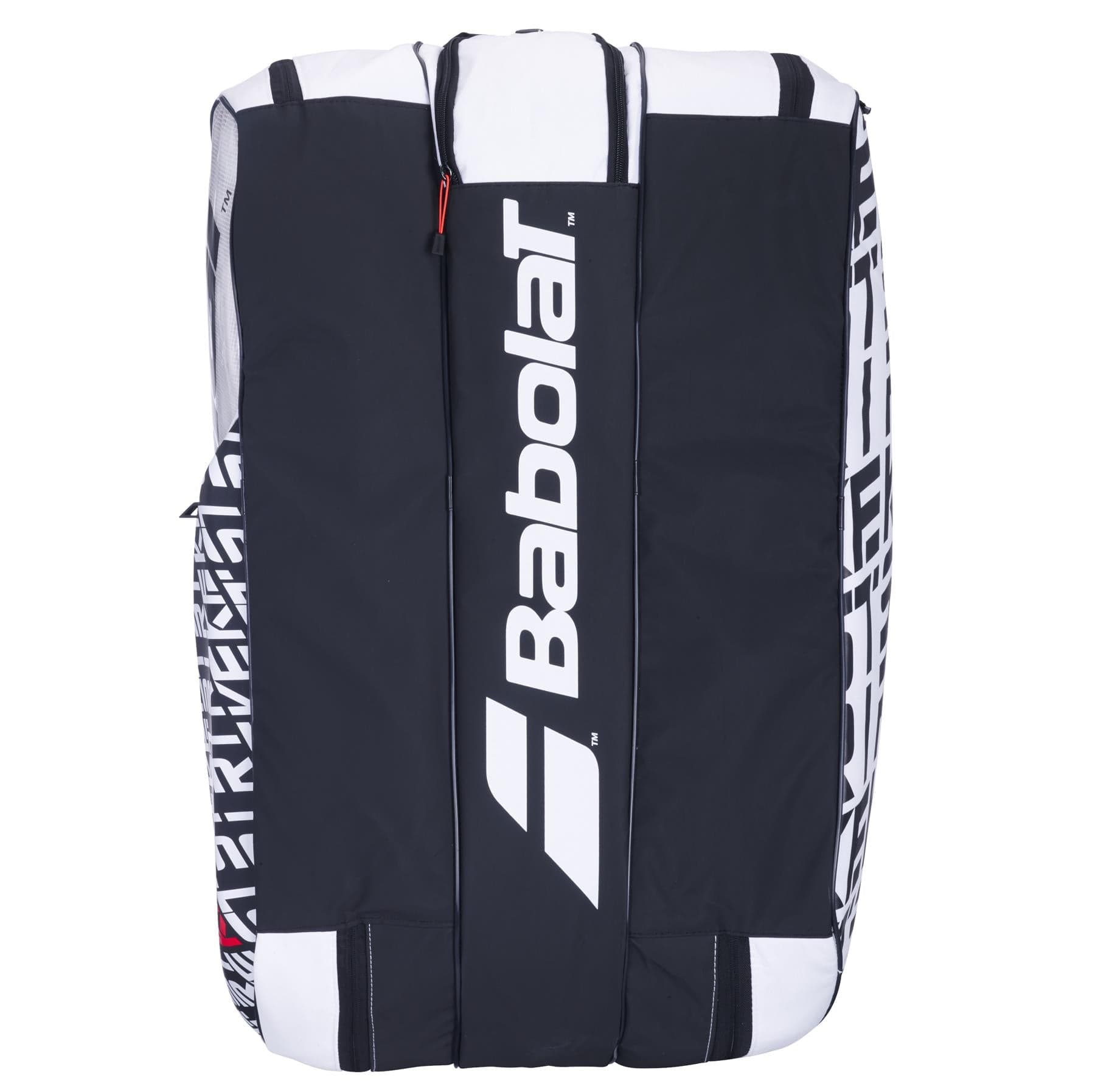 The Babolat RH12 Pure Strike 12 Racket Bag in white, black, and red boasts a striking geometric pattern on its sides. Featuring the Babolat logo prominently in white at the center, it offers a durable insulated compartment designed to keep your gear protected and organized.