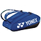 The Yonex 924212EX Pro 12 Racket Badminton Bag in Cobalt Blue, with its sleek and sporty design, prominently displays the iconic white Yonex logo. It includes thermo-guard compartments and has a capacity for 12 rackets, making it ideal for easily carrying all your tennis equipment.