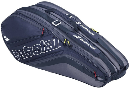Introducing the Babolat Evo Court L Racket Bag in grey and blue, designed with eco-friendly recycled PET material. This bag features multiple zippered compartments and displays the white Babolat logo on its side. For versatile carrying options, handles and shoulder straps are included.