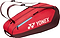 The Yonex 42526EX Team 6 Racket Badminton Bag in ruby red features a large white Yonex logo, multiple zippered compartments, and adjustable shoulder straps—perfect for stylishly carrying your badminton gear.