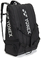 The Yonex BA726212EX Gearlogic 12 Racket Badminton Bag - Black features three zippered compartments, shoulder straps, and white Yonex logos—ideal for securely carrying all your badminton gear to tournaments.