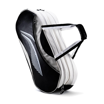 The Li-Ning Competition 6 Racket Badminton Bag in white and black features two zippered compartments, black and white handles, a large black side panel with a white leaf design, and holds up to 6 rackets.