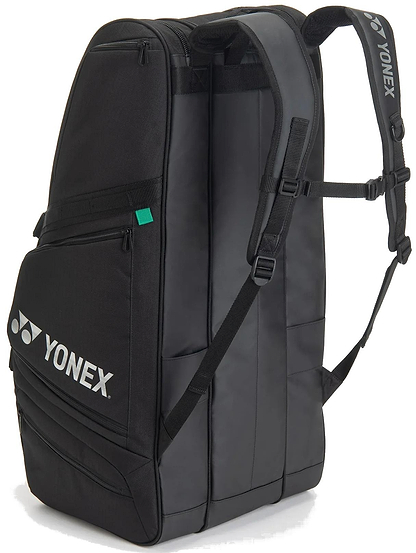 The Yonex BA72629EX Gearlogic 9 Racket Badminton Bag in black features shoulder straps, multiple zippered compartments, and white Yonex logos—ideal for carrying up to nine rackets and all your badminton gear.