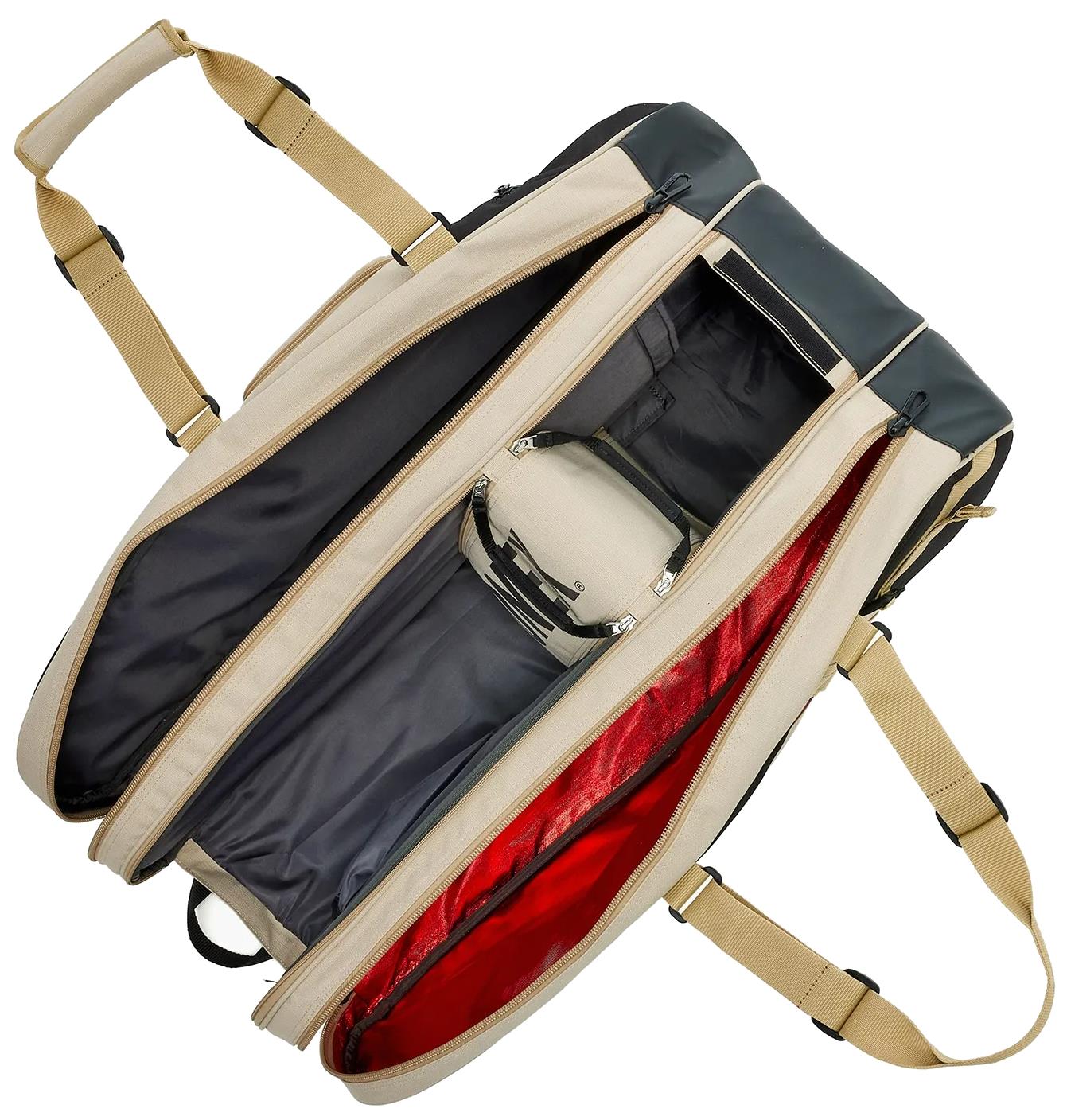 A beige Yonex BA72629EX Gearlogic 9 Racket Badminton Bag is shown with its main compartment unzipped, revealing organized interior sections including a red-lined area and a small beige pouch inside.