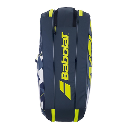 The Babolat RHX6 Pure Aero Racket Bag in grey and yellow features a sturdy, waterproof design with a bold logo. Its elegant style includes several zippered compartments, making it an ideal choice for transporting all your tennis gear.