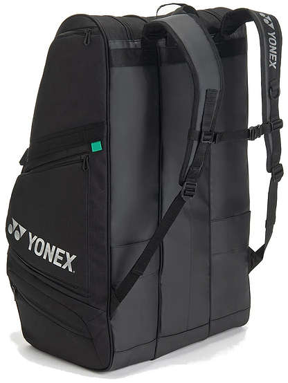 The Yonex BA726212EX Gearlogic 12 Racket Badminton Bag in black features multiple compartments, zippers, and padded adjustable shoulder straps—ideal for carrying sports gear to your next badminton tournament.