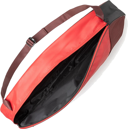 The Yonex 42523EX Team 3 Racket Badminton Bag in Ruby Red features a spacious black interior and a shoulder strap, ideal for carrying up to three rackets in lightweight style.