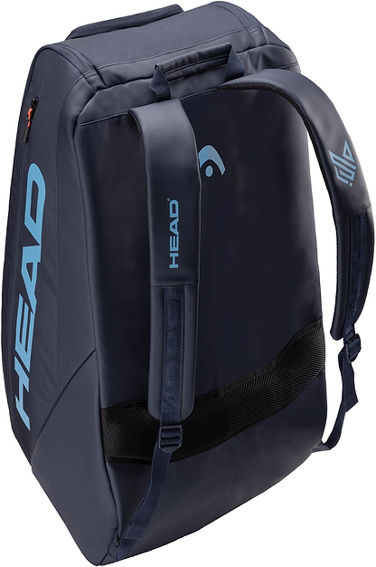 The HEAD Pro 12 Racket Badminton Bag XL - Navy is shown from the rear, featuring light blue branding, padded shoulder straps, a top handle, and a zippered main compartment for easy access and comfort.