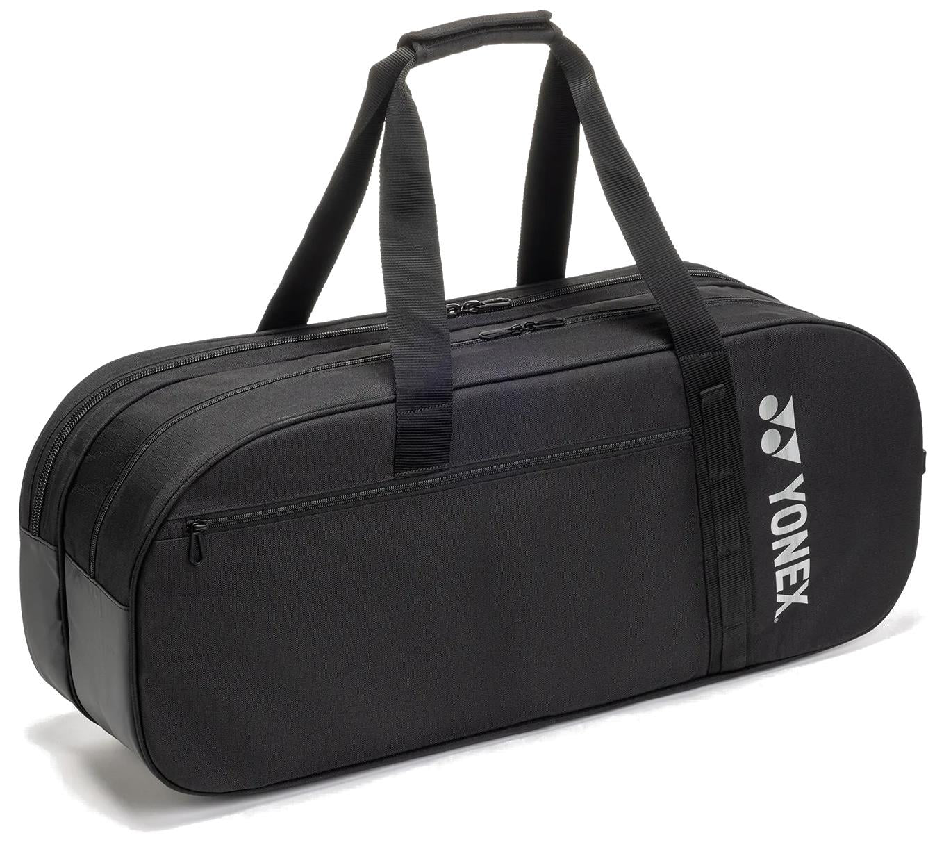 The Yonex BA72631WEX Gearlogic Tournament Badminton Bag in black features two main compartments, double handles, a small front pocket, and a white Yonex logo on the side. Brand: Yonex. Positioned on a white background.