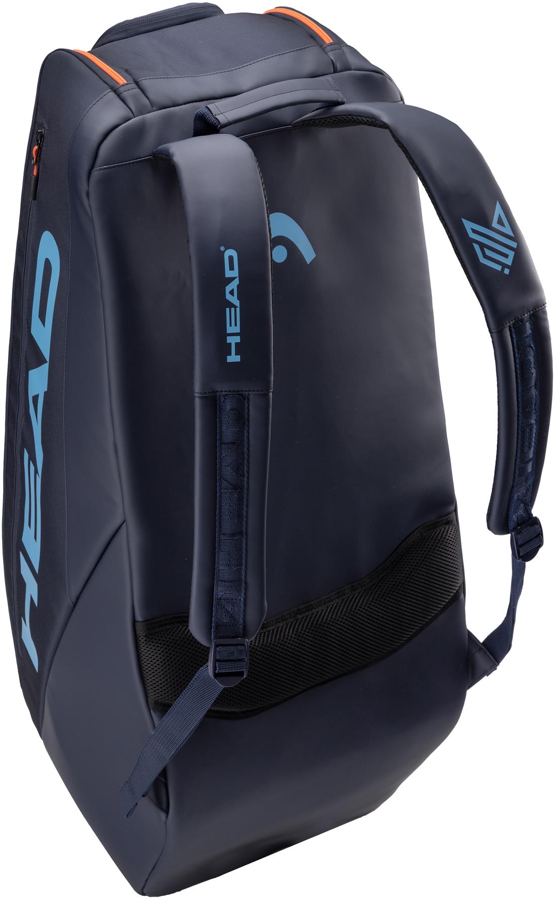 The HEAD Pro 9 Racket Badminton Bag L - Navy features a boxy design inspired by Jannik Sinner, padded straps, CCT+ climate control, and light blue HEAD branding on the shoulder strap and side.