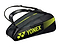 The Yonex 82426EX Active 6 Racket Badminton Bag in Black/Lime has shoulder straps and multiple compartments, including one for shoes, making it ideal for carrying rackets and sports gear.